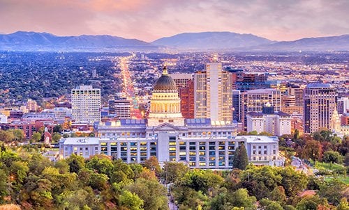 Utah mountain backdrop with cityscape in foreground