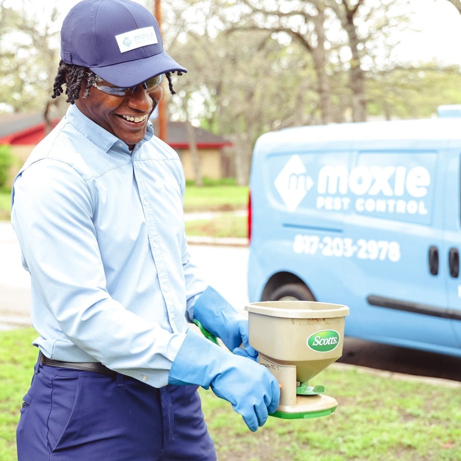 General pest control technician inspecting residential property