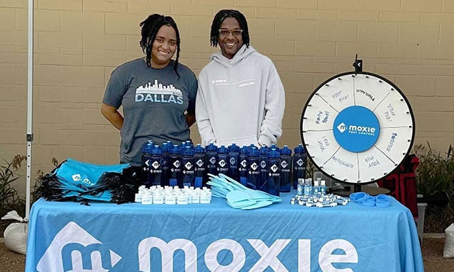 Smiling Moxie employees at company event