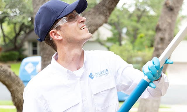 Moxie field technician performing outdoor service